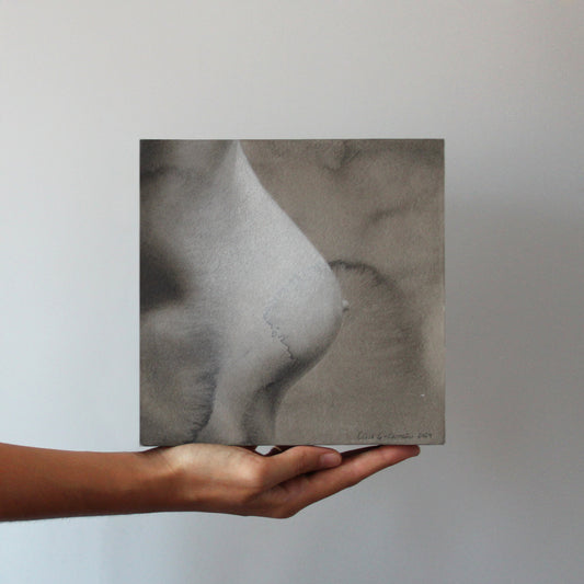 Obra Fragmentos de Eva II sujeta por una mano